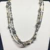 19_ Triple strand beaded necklace with semi-precious stones, pearls, metals, glass and crystal. $75