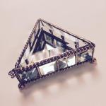 03_Triangle box, bevels, mirror, safety chain, embellishments, copper patina. 4". $145