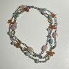 22_ Sterling silver and semi precious stones: quartz, carnelian, rose quartz, citrine, green turquoise 14" $125