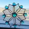 21_ Teal clear itrridized granite snowflake 6" $40
